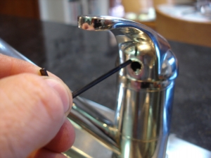 Hex key to undo mixer handle grub screw