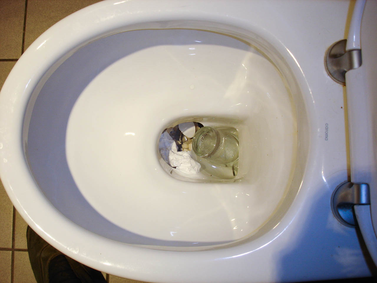 beer glass breaks toilet