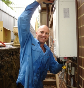 Adelaide plumber Josh installing gas hot water